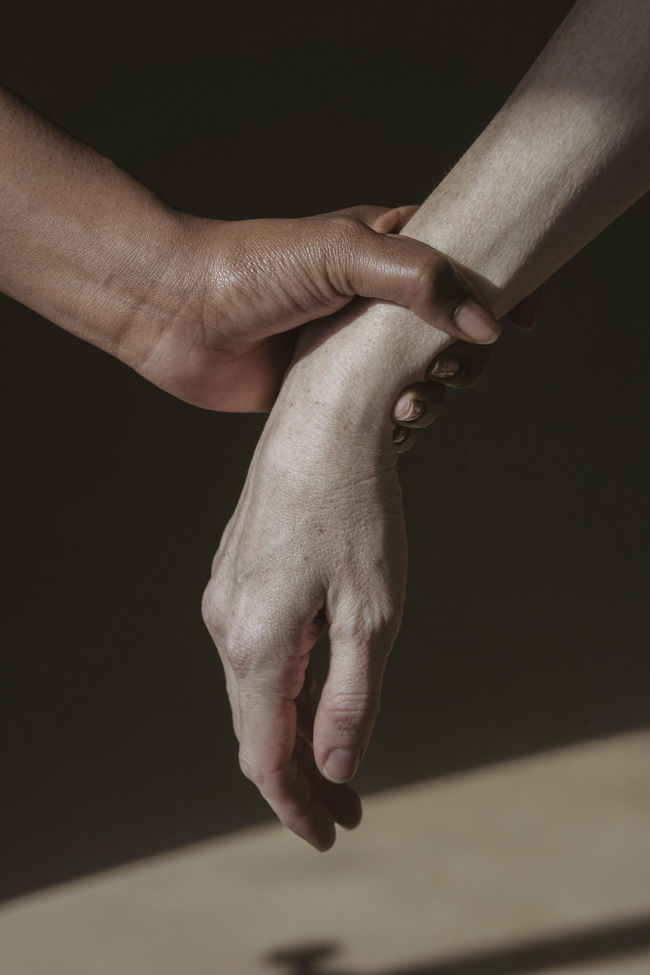 Person grabbing hand of partner