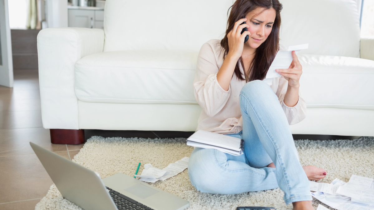 woman on phone for bills