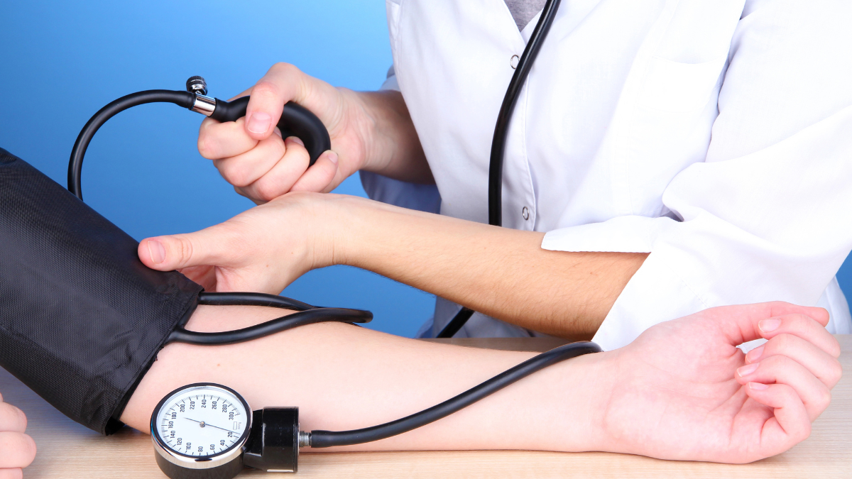 doctor taking blood pressure