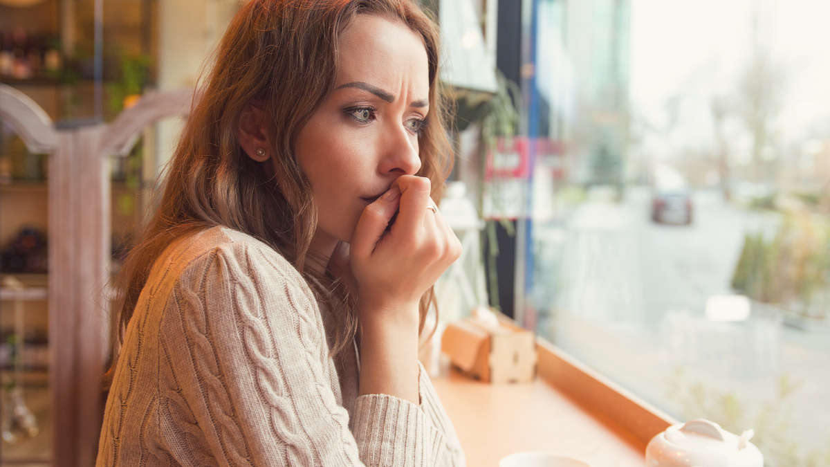 girl biting nails