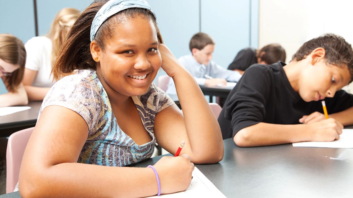 kids writing in school