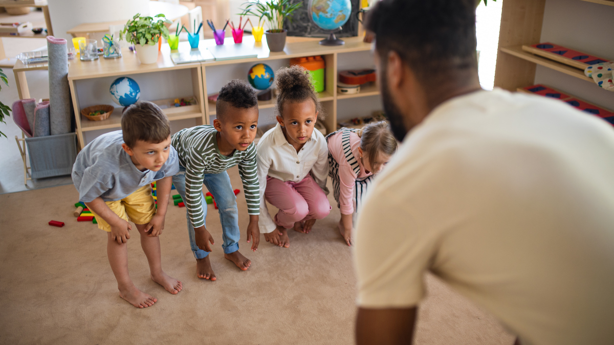 man talking to kids
