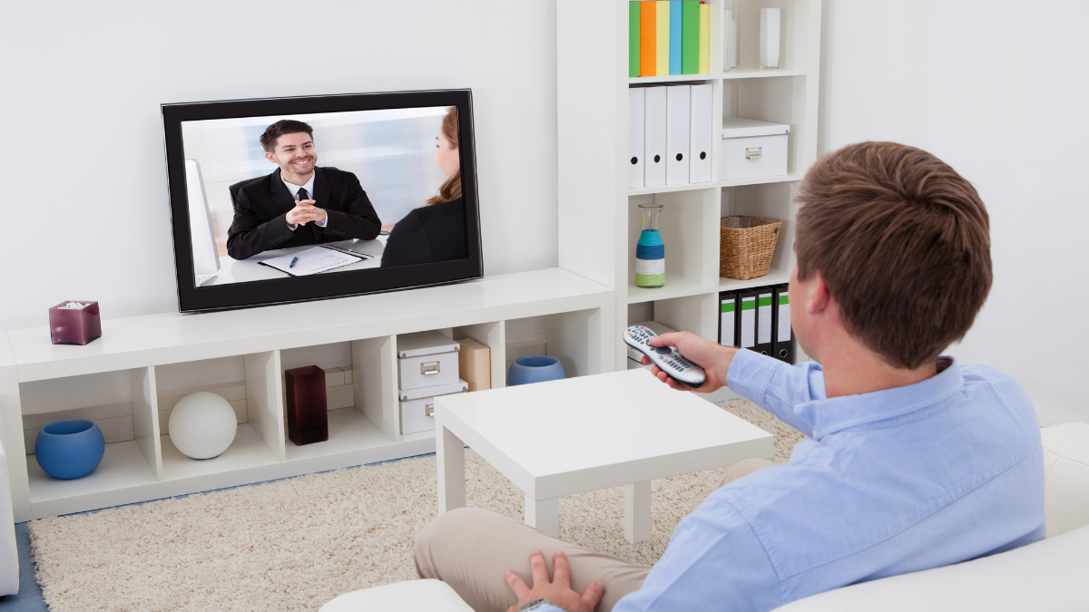 man watching tv