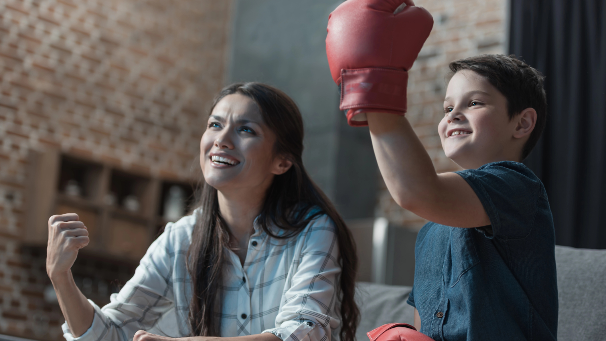 mom and kid making fists