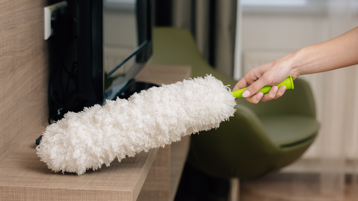 person dusting