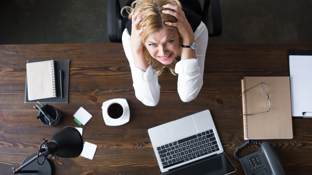 stressed woman at desk