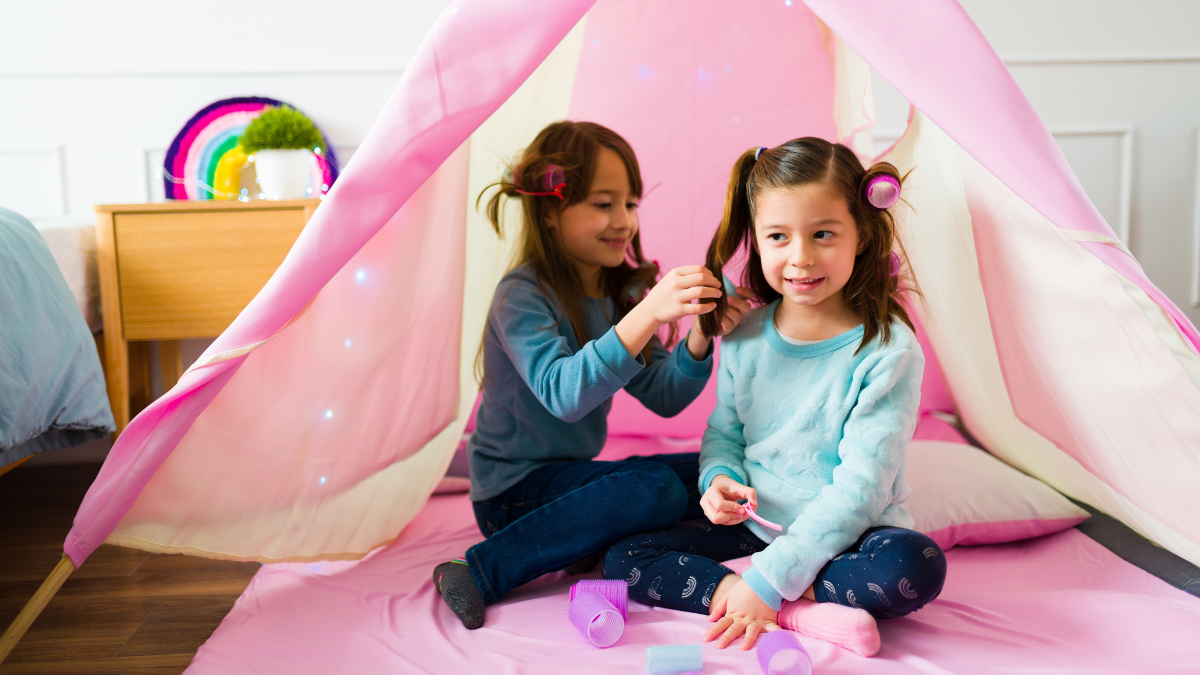 two girls in tent