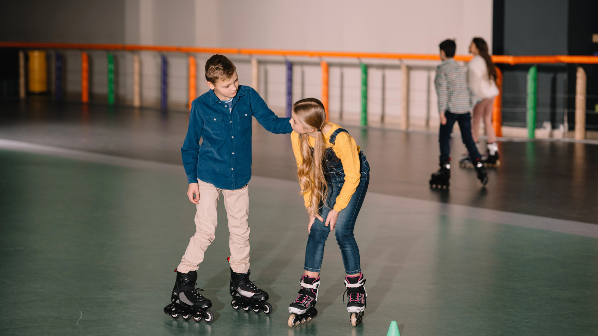 two kids roller skating