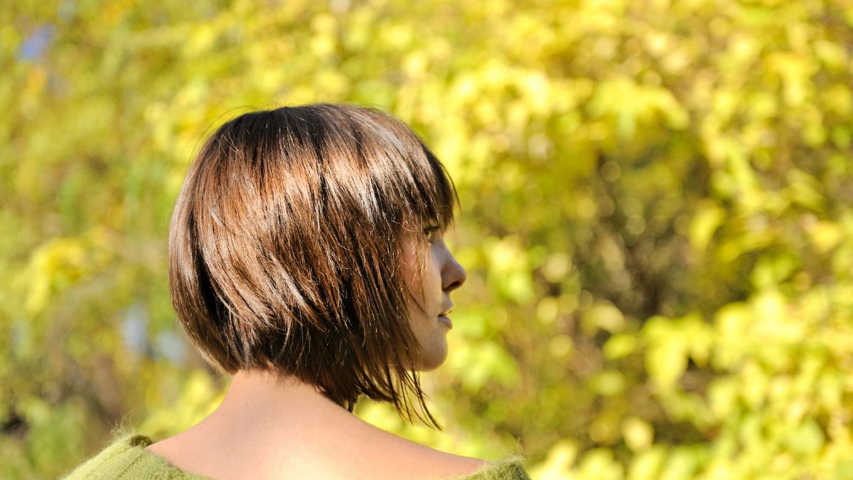 woman with short hair outside