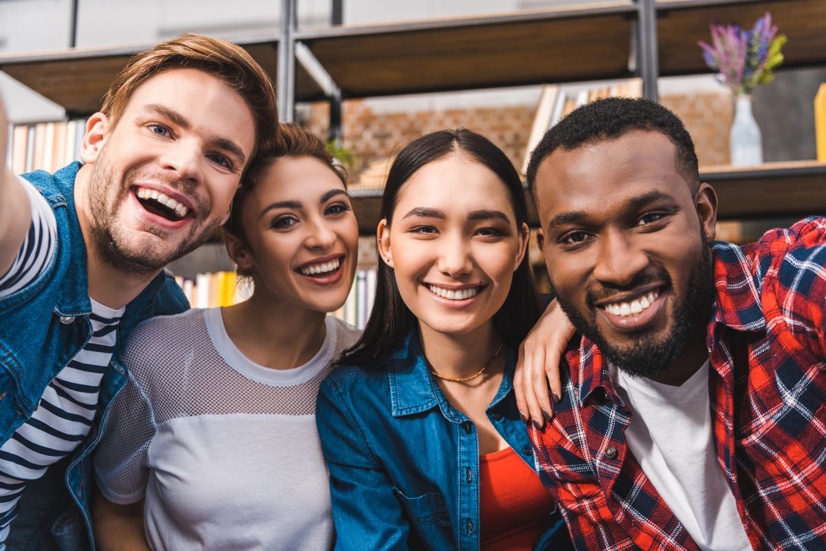 friends happily taking a pic together.