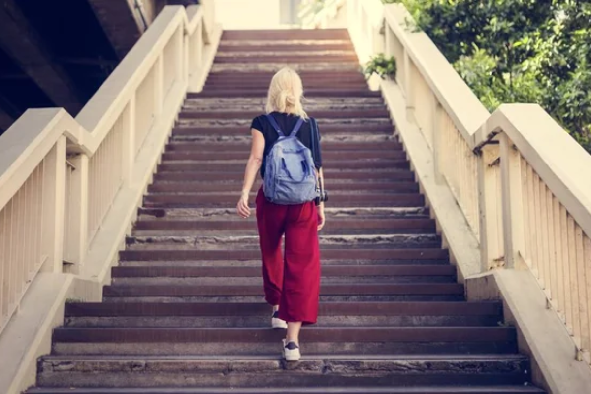 Woman Walking Stairs