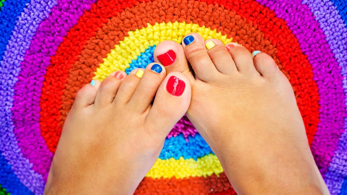 feet on a colorful carpet