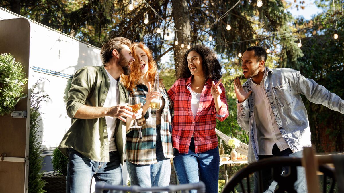 friends outside a tiny house