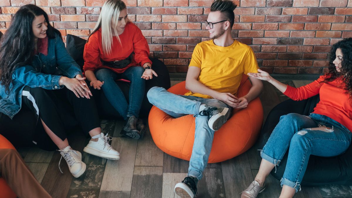 friends sitting on bean bags