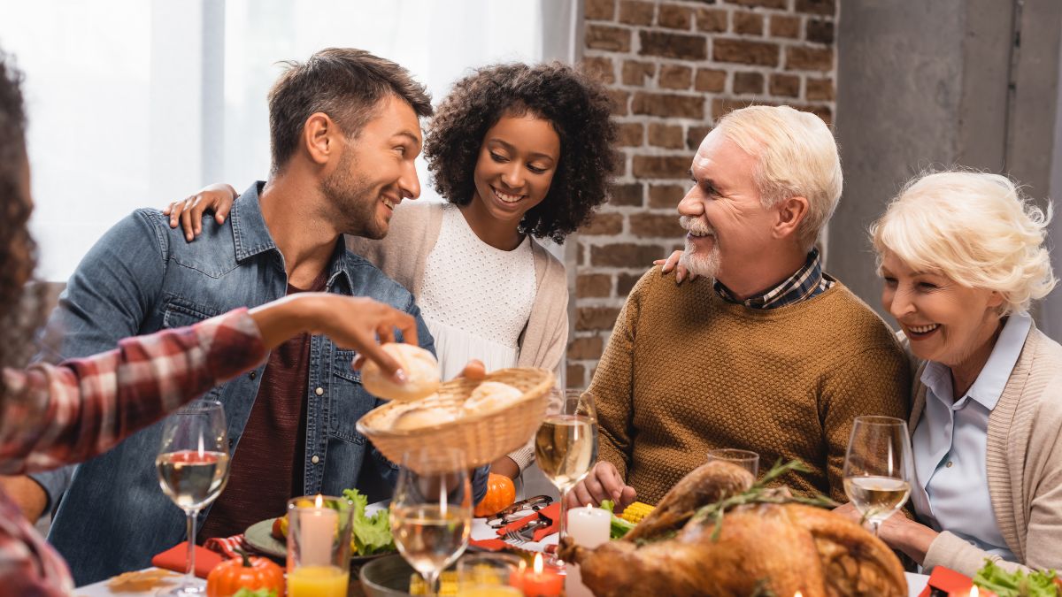 happy family having thanksgiving dinner