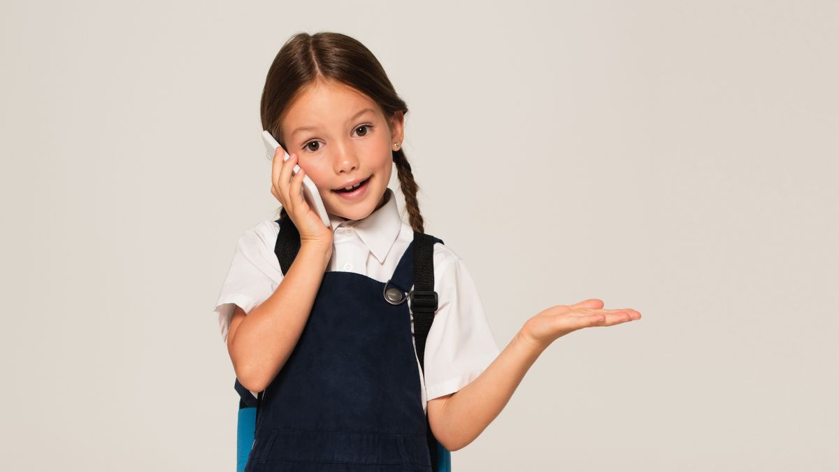 little girl on phone