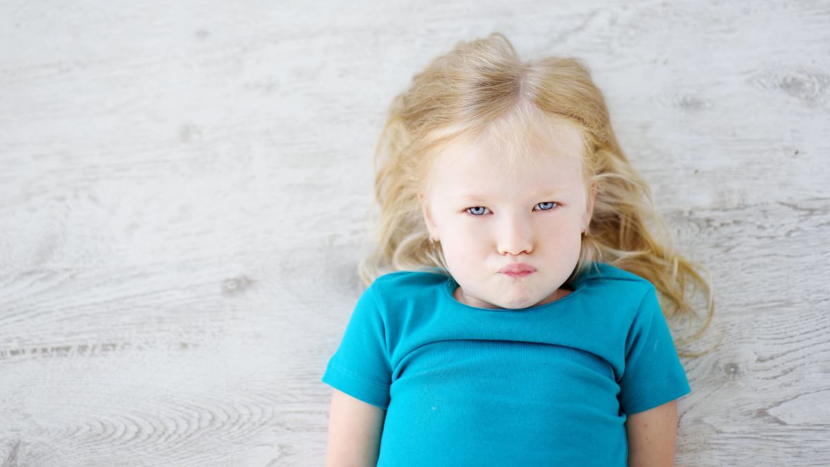 little girl with sad face