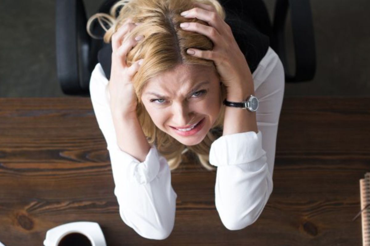stressed woman at desk