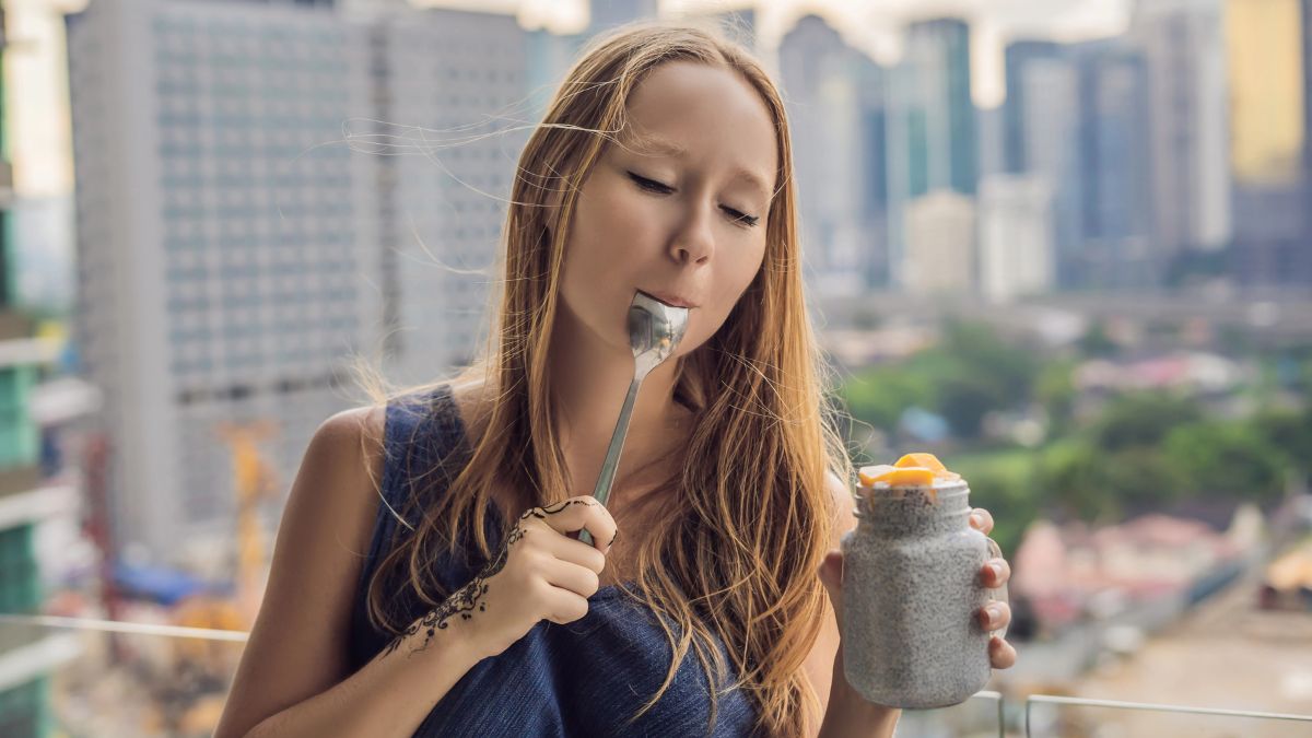 woman eating chia pudding