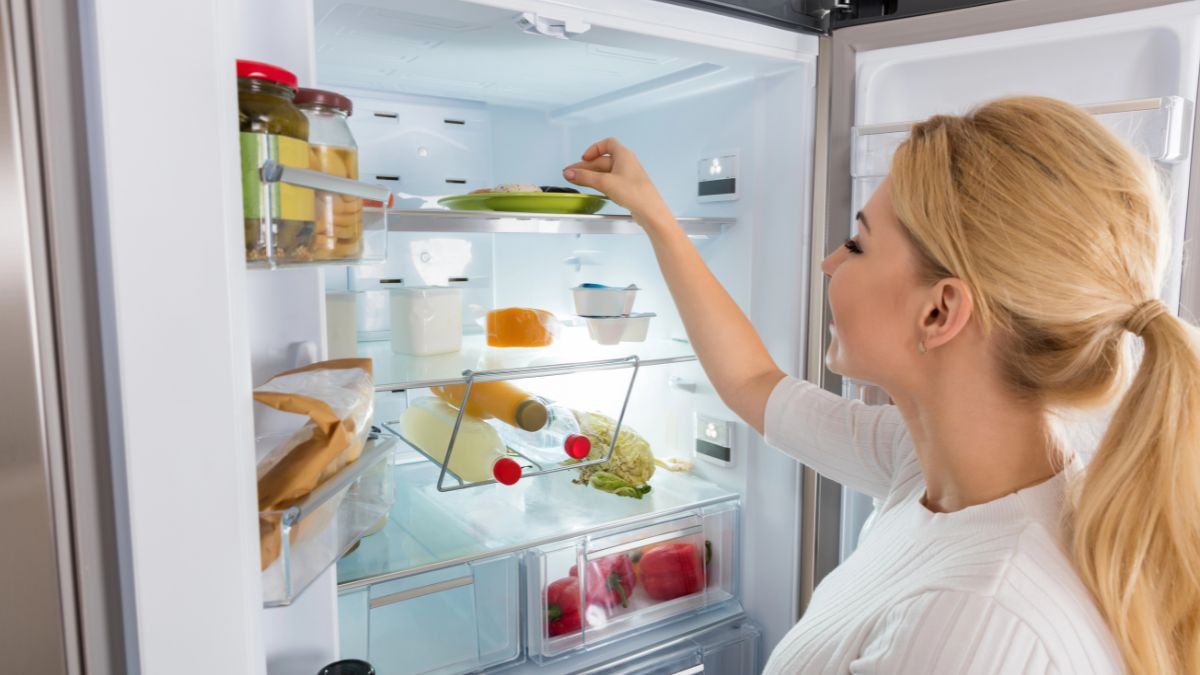 woman looking in Refrigerator
