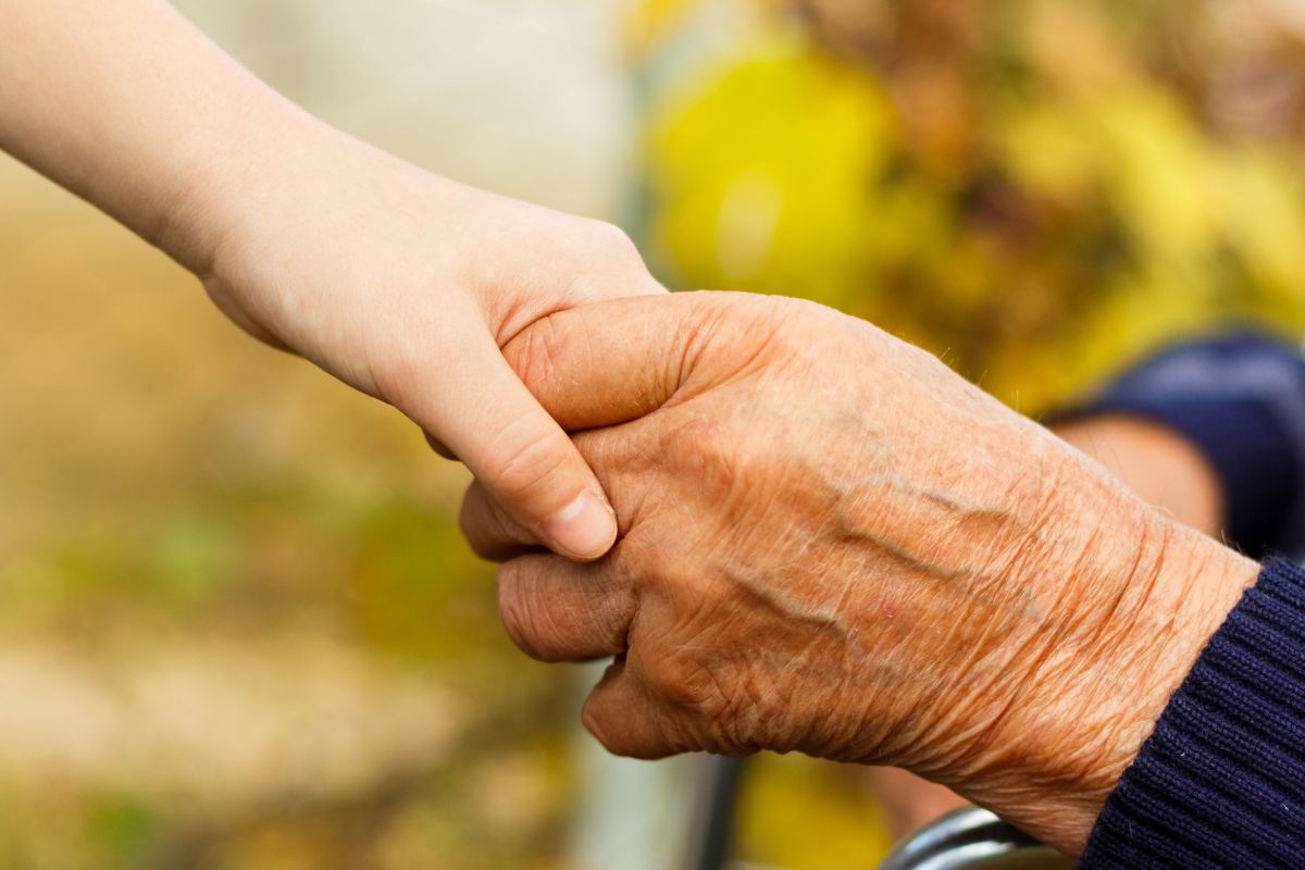 An older hand and younger hand