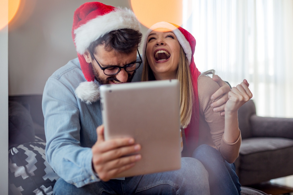 Couple buying Christmas gifts online