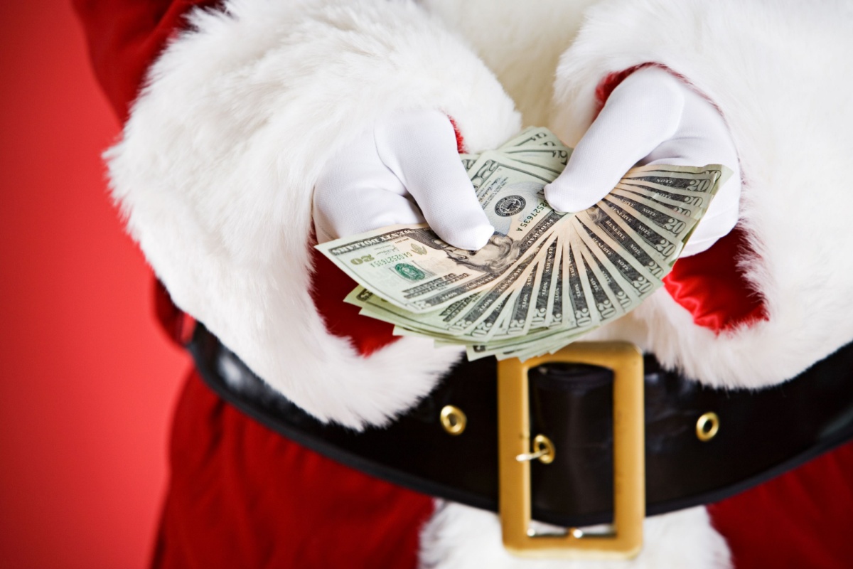 Santa Holding Out A Money Fan Christmas