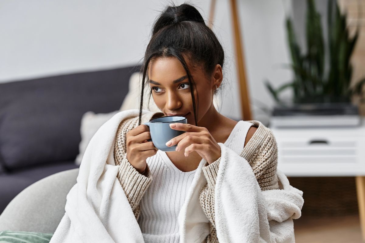Woman sipping tea relaxing