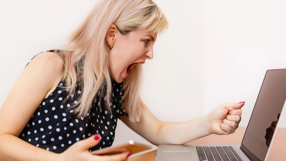 angry woman on phone and computer
