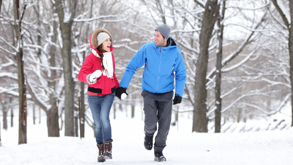 couple walking in the snow