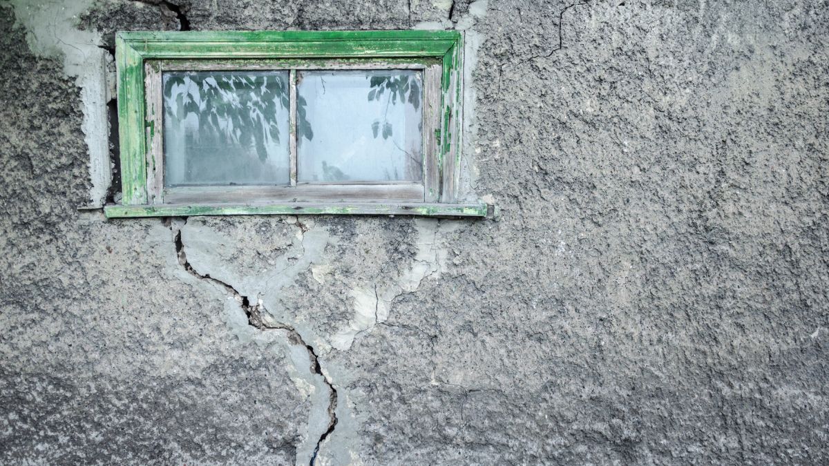 cracked wall with window