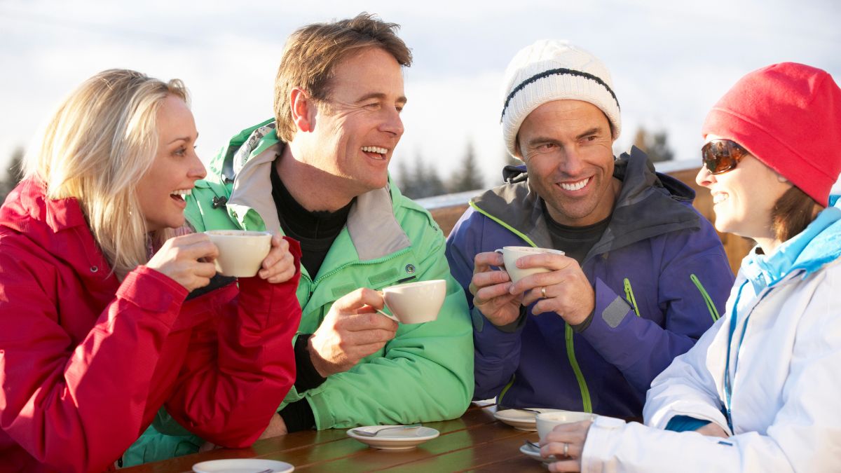 friends drinking at ski resort