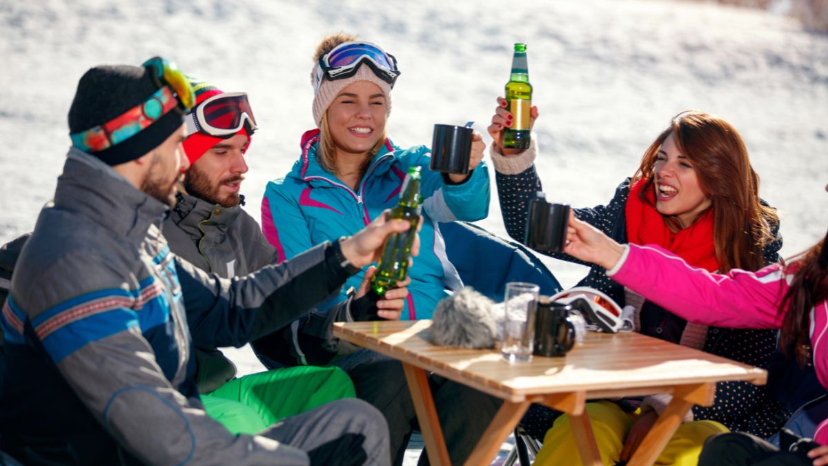 friends having drinks at ski lodge