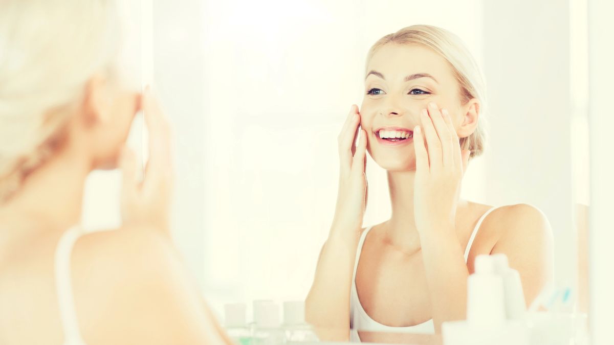 woman cleaning face