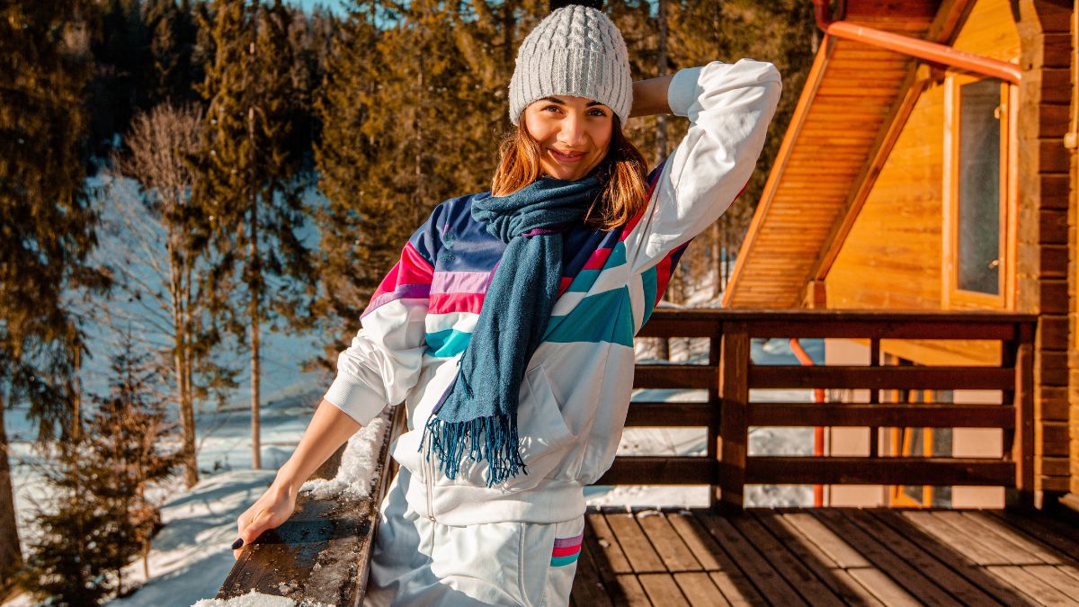 woman outside ski lodge