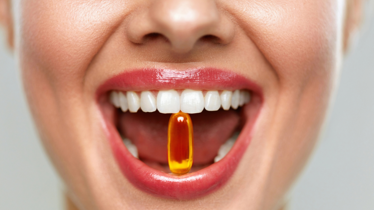 woman taking vitamins