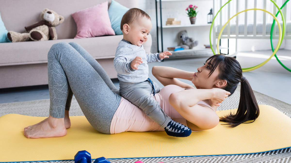 woman working out with baby