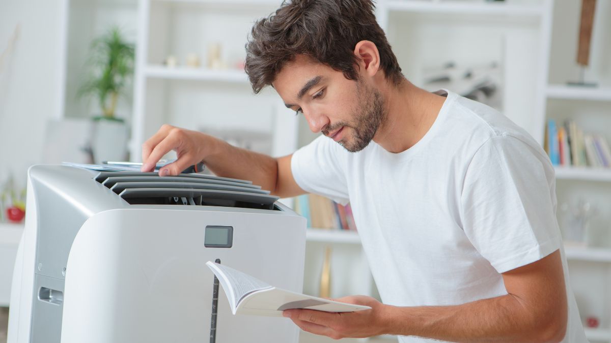 man reading Instruction Manual