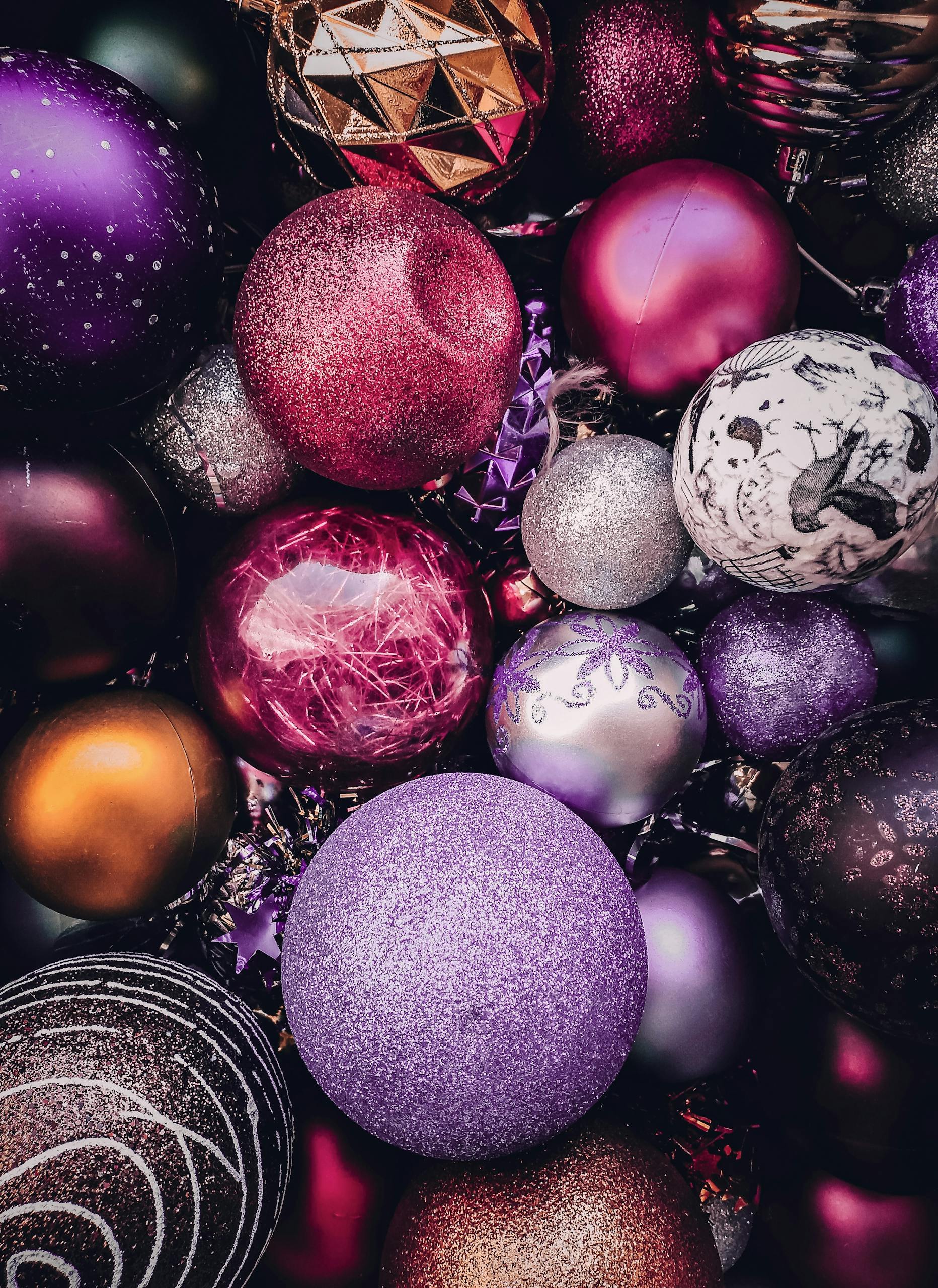 A captivating collection of colorful Christmas ornaments in vibrant tones, perfect for festive decor.