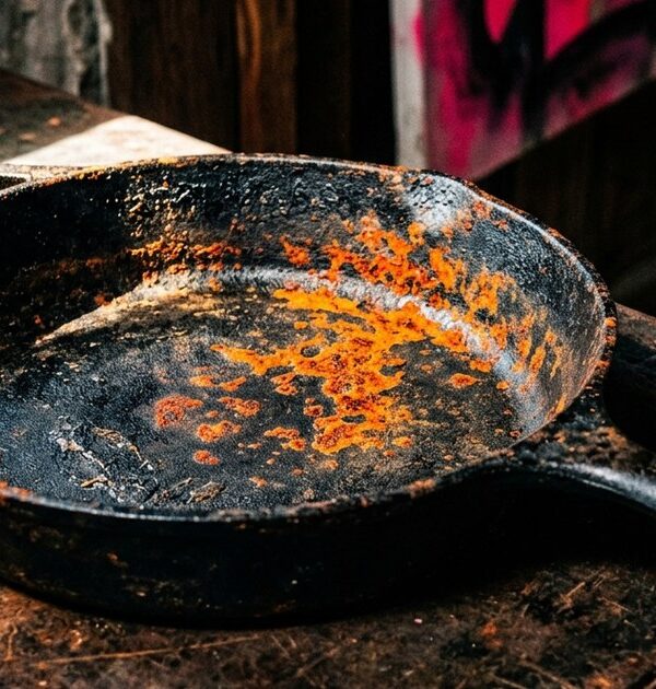 Why does my cast iron pan keep rusting even after seasoning it