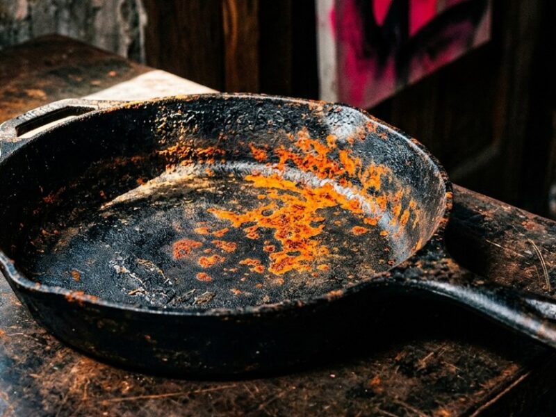 Why does my cast iron pan keep rusting even after seasoning it